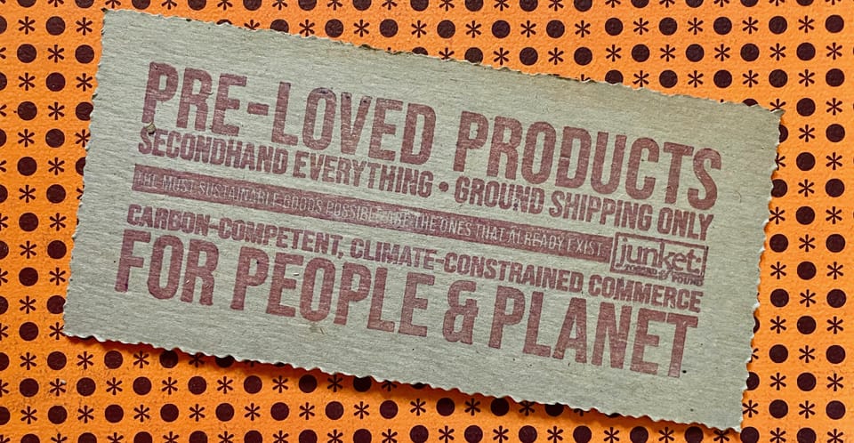 Image desc: Stamped cardboard reads: pre-loved products for people & planet • secondhand everything • ground shipping only